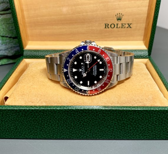 A vintage Rolex GMT with a Pepsi bezel in exceptional condition and complete 18