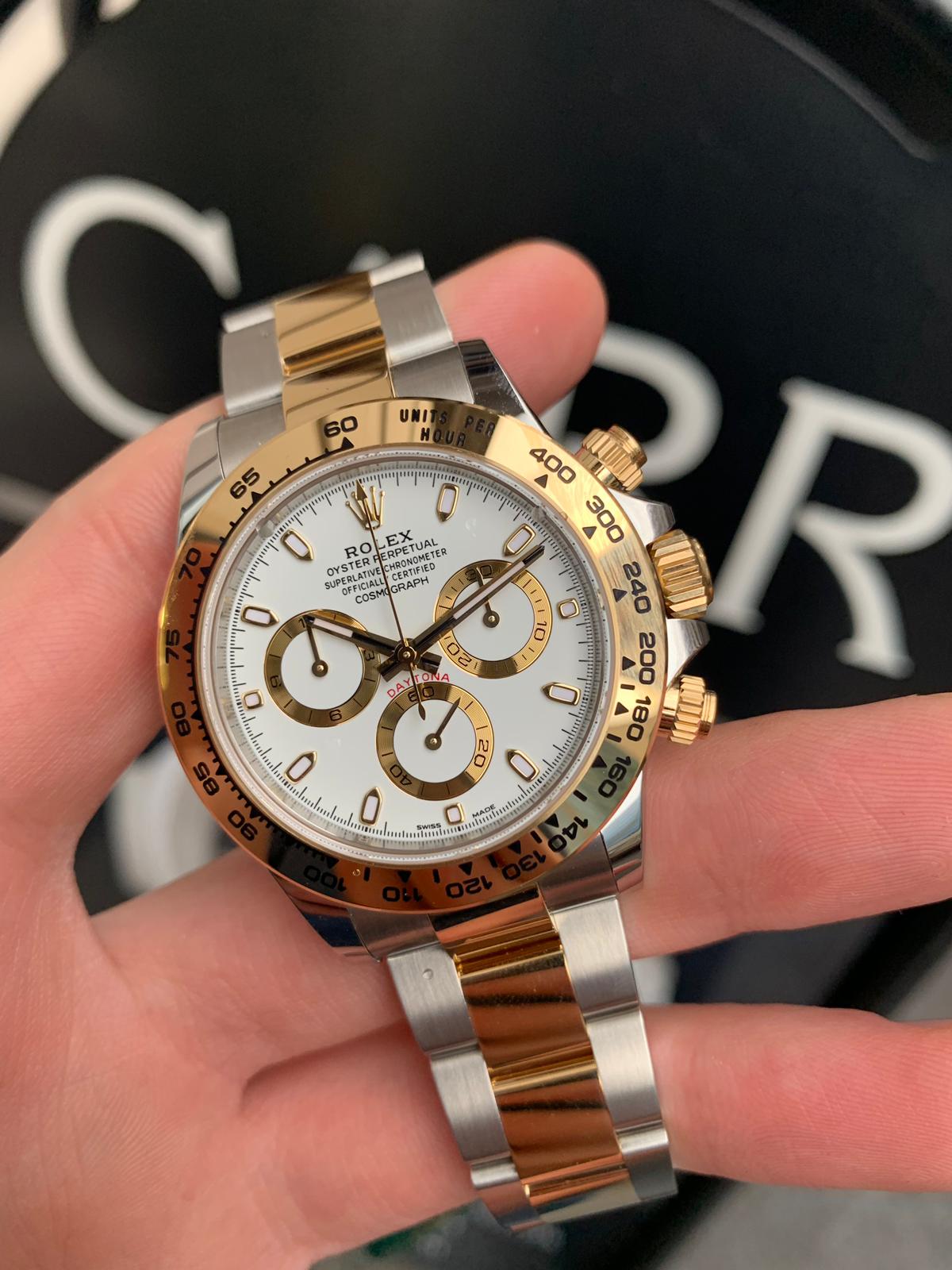 Rolex cosmograph Daytona 18ct yellow gold and stainless steel White ...