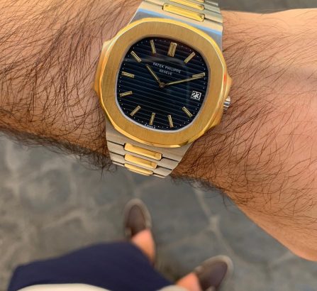 PATEK PHILIPPE NAUTILUS 18CT YELLOW GOLD AND STAINLESS STEEL
