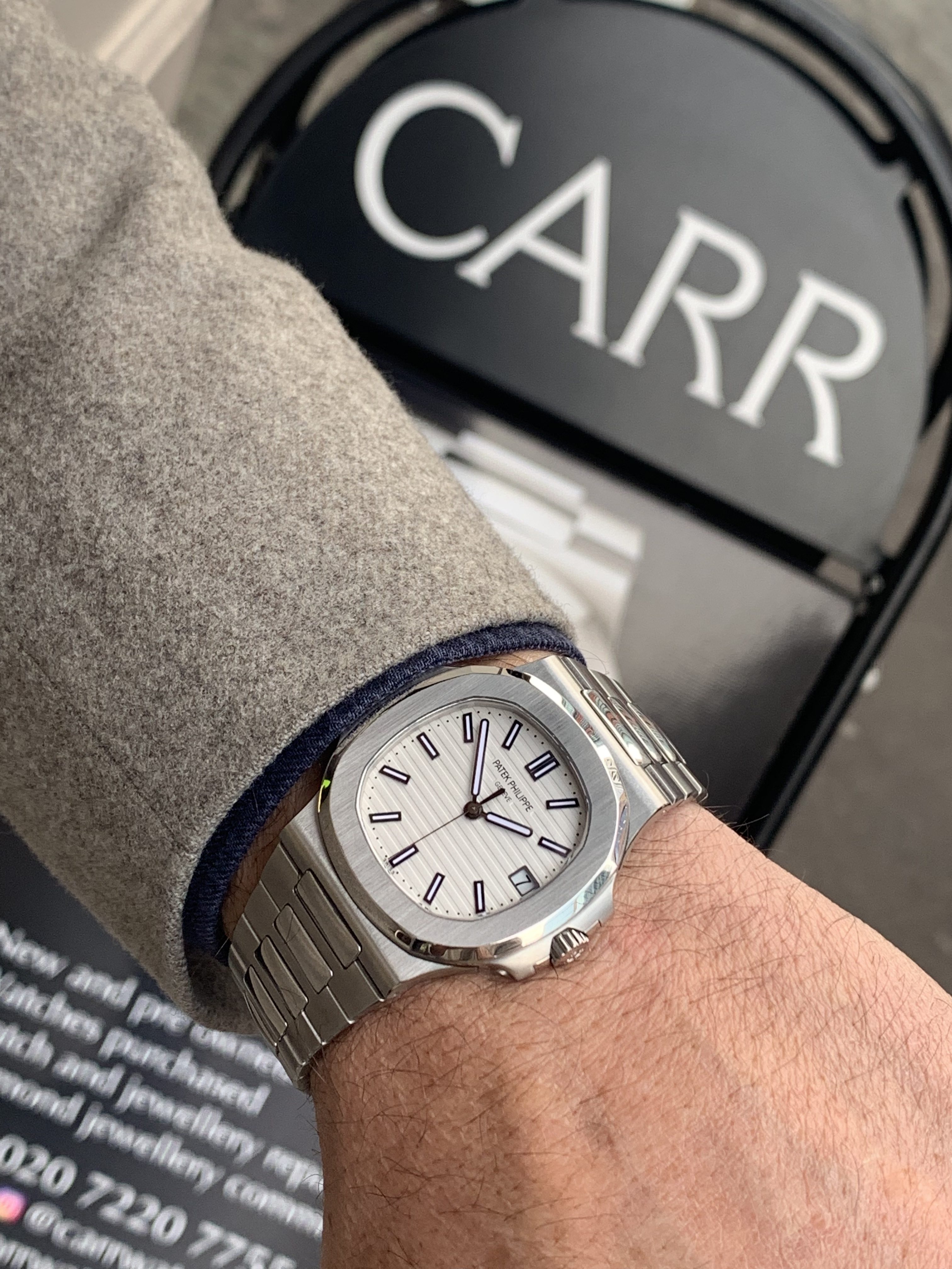 PATEK PHILIPPE NAUTILUS 5711 STAINLESS STEEL WHITE DIAL - Carr Watches