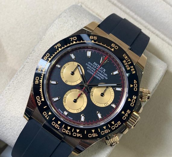 ROLEX COSMOGRAPH DAYTONA 18CT YELLOW GOLD BLACK AND CHAMPAGNE COLOUR DIAL 116518LN 36