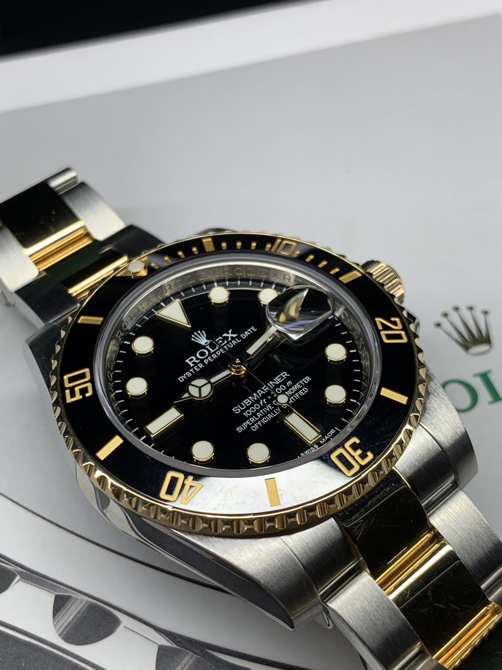 ROLEX SUBMARINER STAINLESS STEEL AND 18CT YELLOW GOLD 116613LN - Carr 