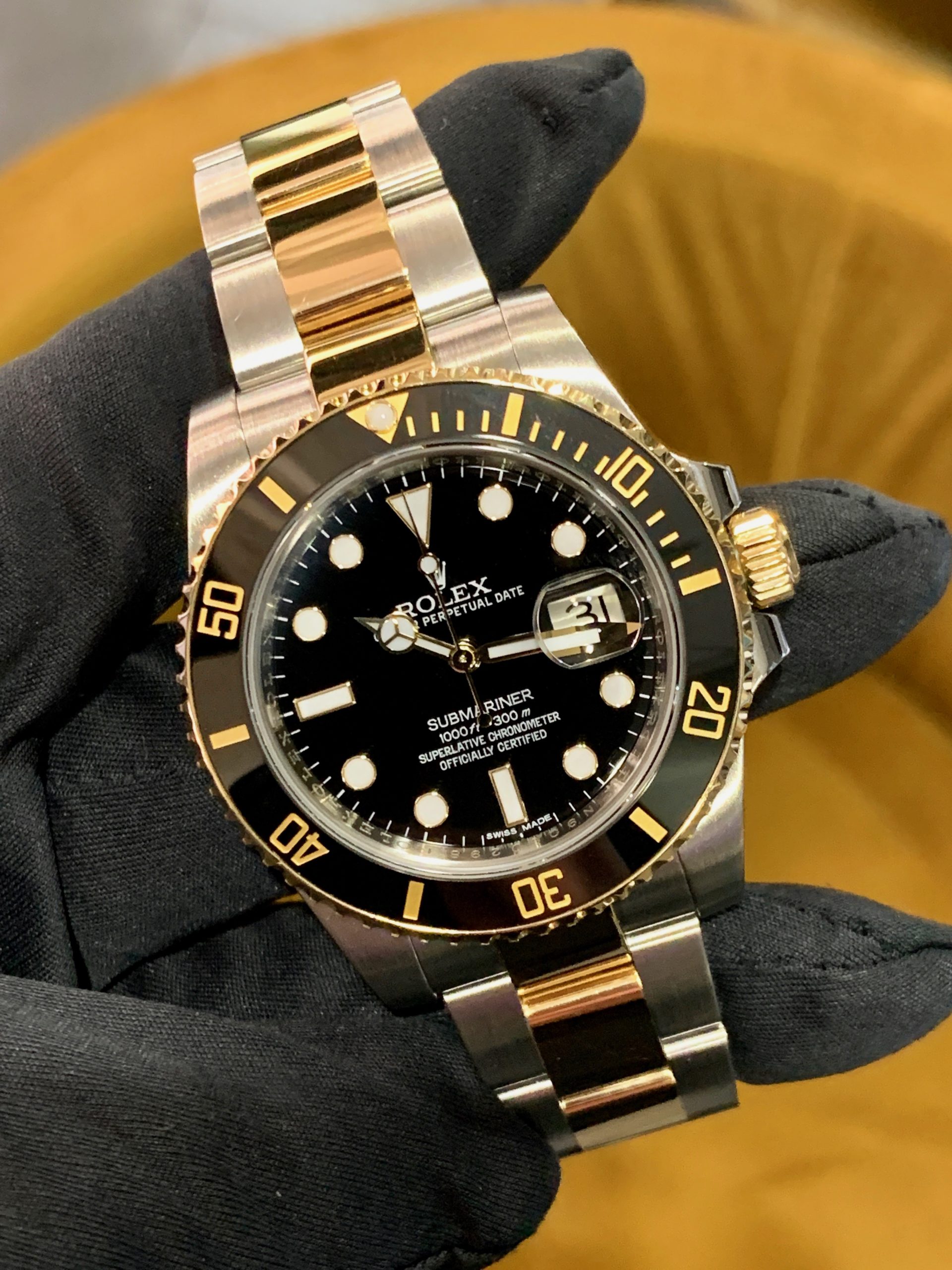 Rolex submariner two best sale tone black and gold