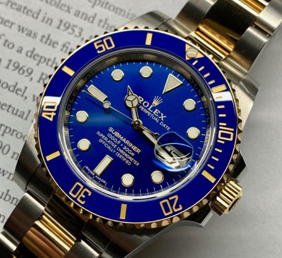 A 2019 ROLEX SUBMARINER STEEL AND GOLD 116613LB 7
