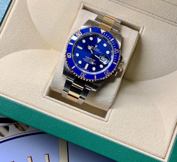 A 2019 ROLEX SUBMARINER STEEL AND GOLD 116613LB 8