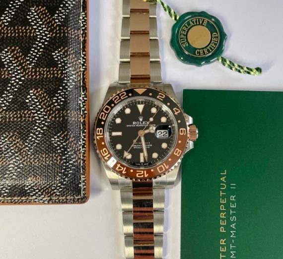 A 2021 ROLEX GMT MASTER  IN 18CT ROSE GOLD AND STEEL 10