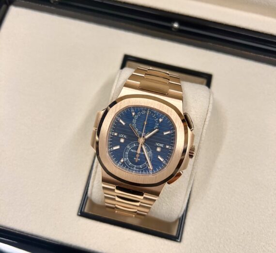 PATEK PHILIPPE NAUTILUS TRAVEL TIME MODEL 5990/1R 12